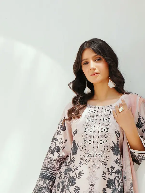 Model wearing a printed two-piece lawn suit